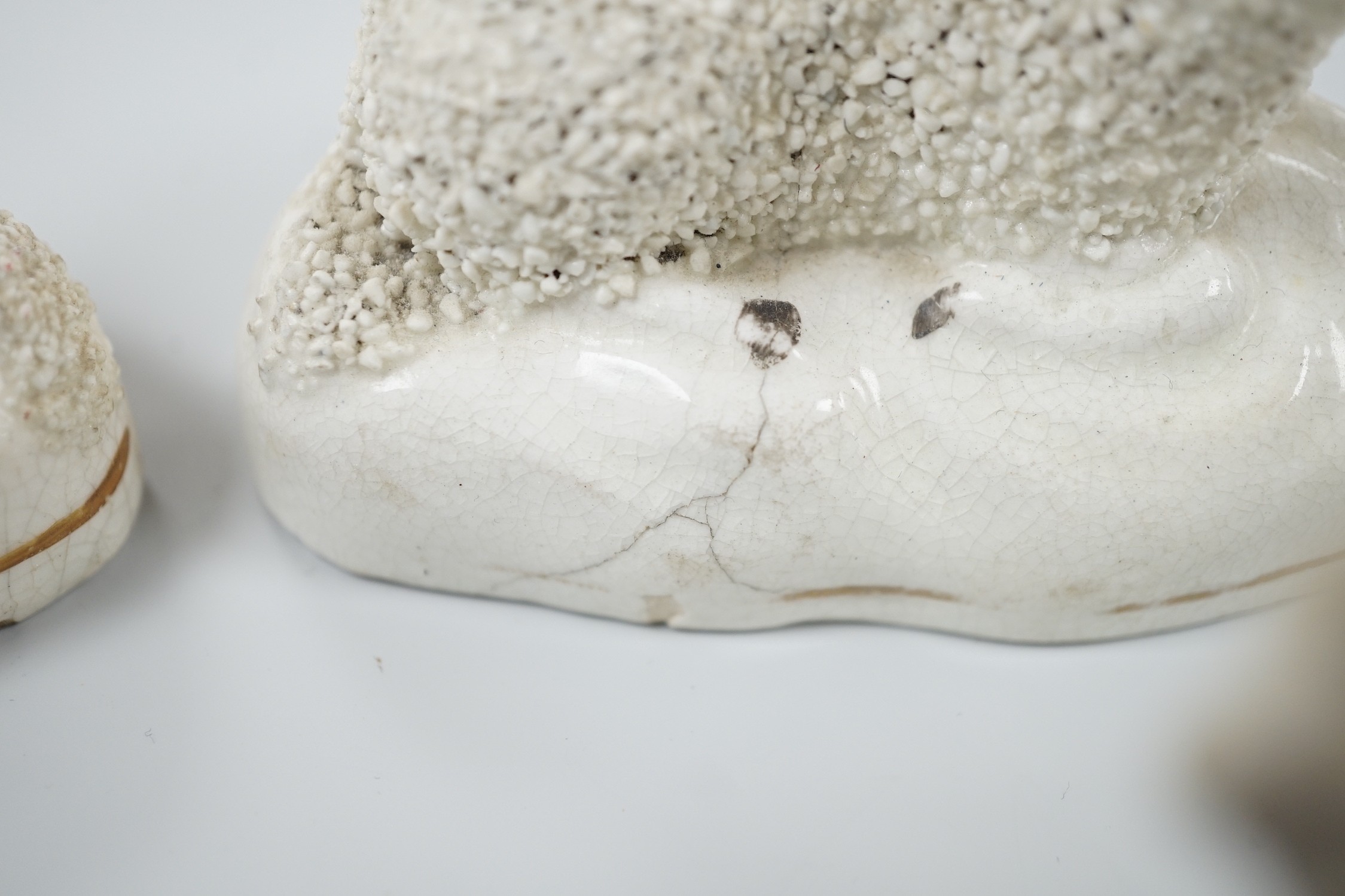 Four small Staffordshire models of recumbent sheep, c.1830-50. 8.5cm long, Provenance: Dennis G.Rice collection